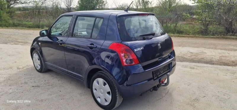 Suzuki Swift 1.3i 4x4 , снимка 10 - Автомобили и джипове - 45083419