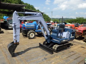 Багер Kubota KX-014