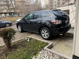 Mazda CX-7 4х4/Газ.Инж/Кожа/Обслужена/ВсичкоПлатено - 2200 € / 4302.83 лв. - 49489158 7