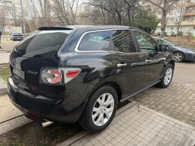 Mazda CX-7 4х4/Газ.Инж/Кожа/Обслужена/ВсичкоПлатено - 2200 € / 4302.83 лв. - 49489158 5