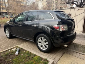 Mazda CX-7 4х4/Газ.Инж/Кожа/Обслужена/ВсичкоПлатено - 2200 € / 4302.83 лв. - 49489158 11