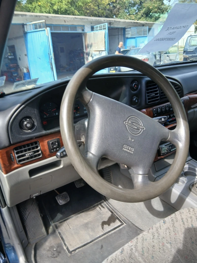 SsangYong Musso, снимка 10 - Автомобили и джипове - 52334601
