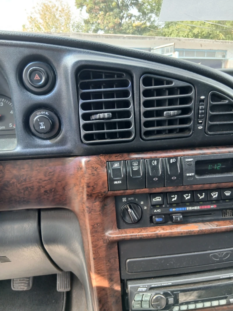 SsangYong Musso, снимка 12 - Автомобили и джипове - 52334601