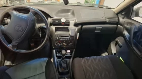 Opel Astra 1, 6 Комби, снимка 7