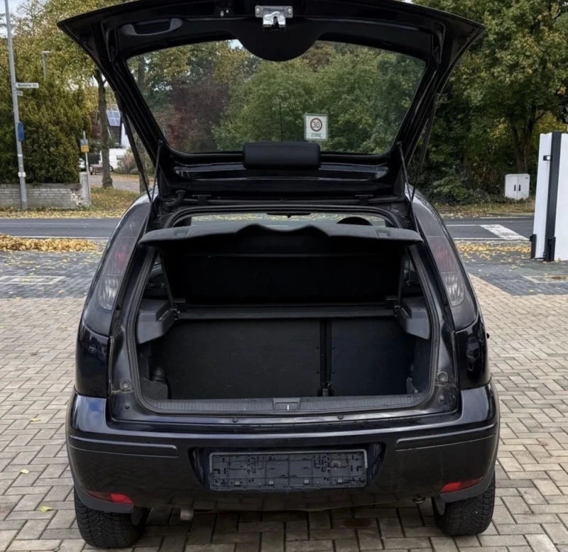 Opel Corsa 1.2 twinport, снимка 10 - Автомобили и джипове - 52672856