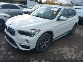 BMW X1 2.0L I4 FI DOHC 16V NF4 All Wheel Drive, снимка 2