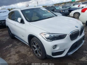 BMW X1 2.0L I4 FI DOHC 16V NF4 All Wheel Drive, снимка 1