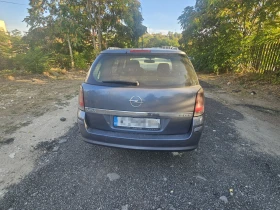 Opel Astra Комби, снимка 8