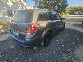 Opel Astra Комби, снимка 7