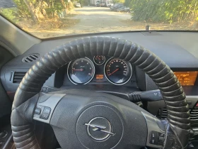 Opel Astra Комби, снимка 11