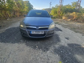 Opel Astra Комби, снимка 1