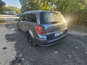 Opel Astra Комби, снимка 9