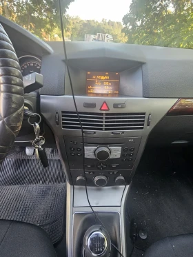 Opel Astra Комби, снимка 13
