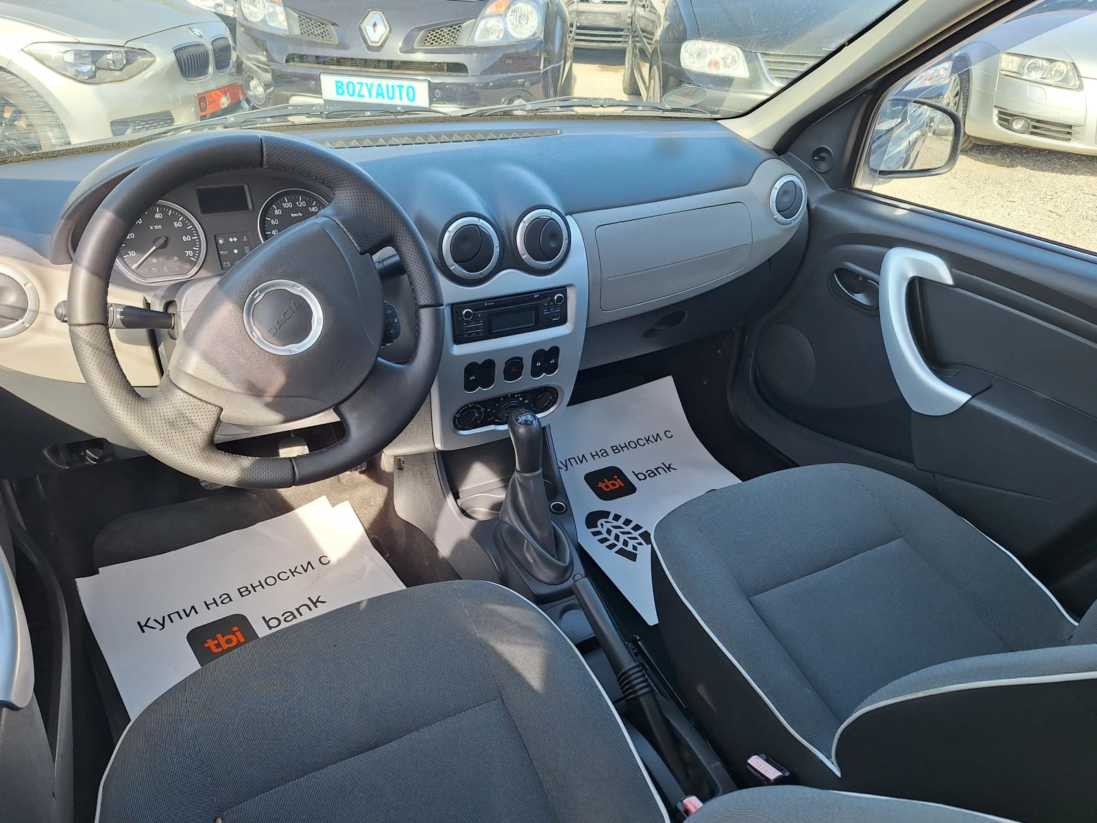 Dacia Logan 1.6i, снимка 16 - Автомобили и джипове - 54224613