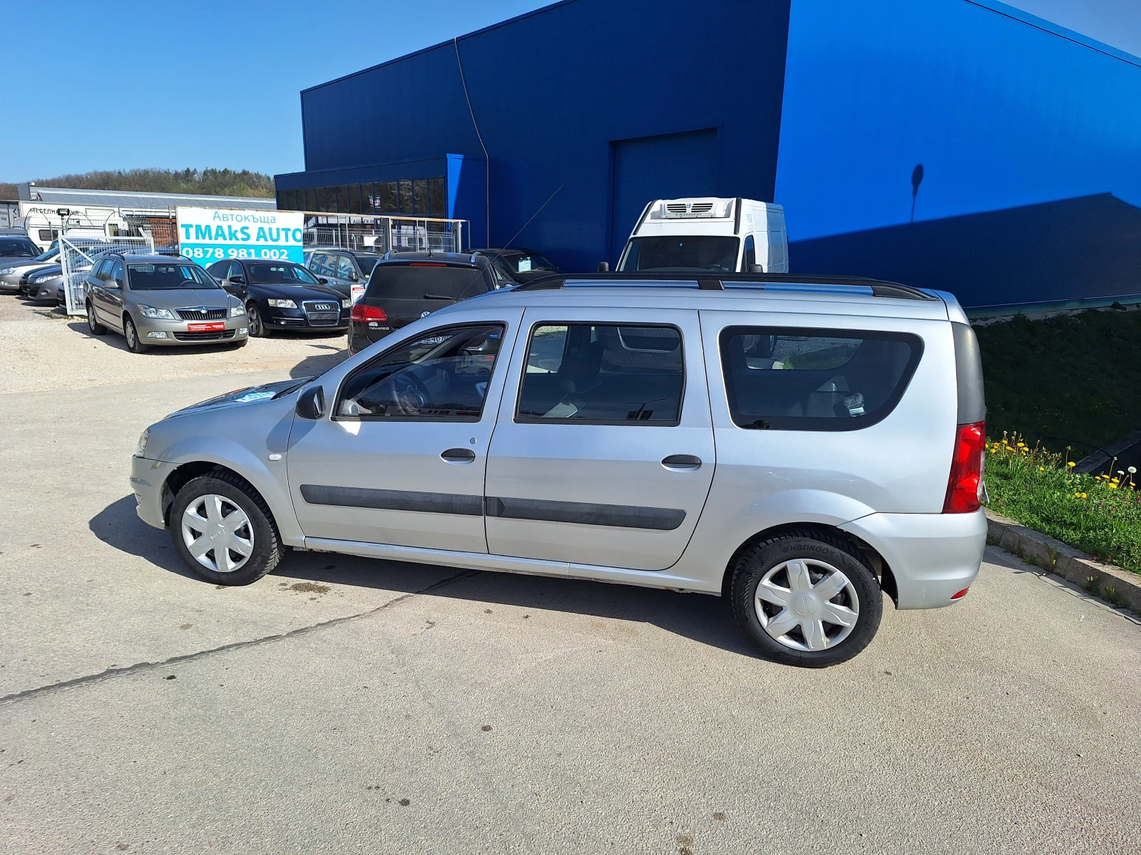 Dacia Logan 1.6i, снимка 10 - Автомобили и джипове - 54224613