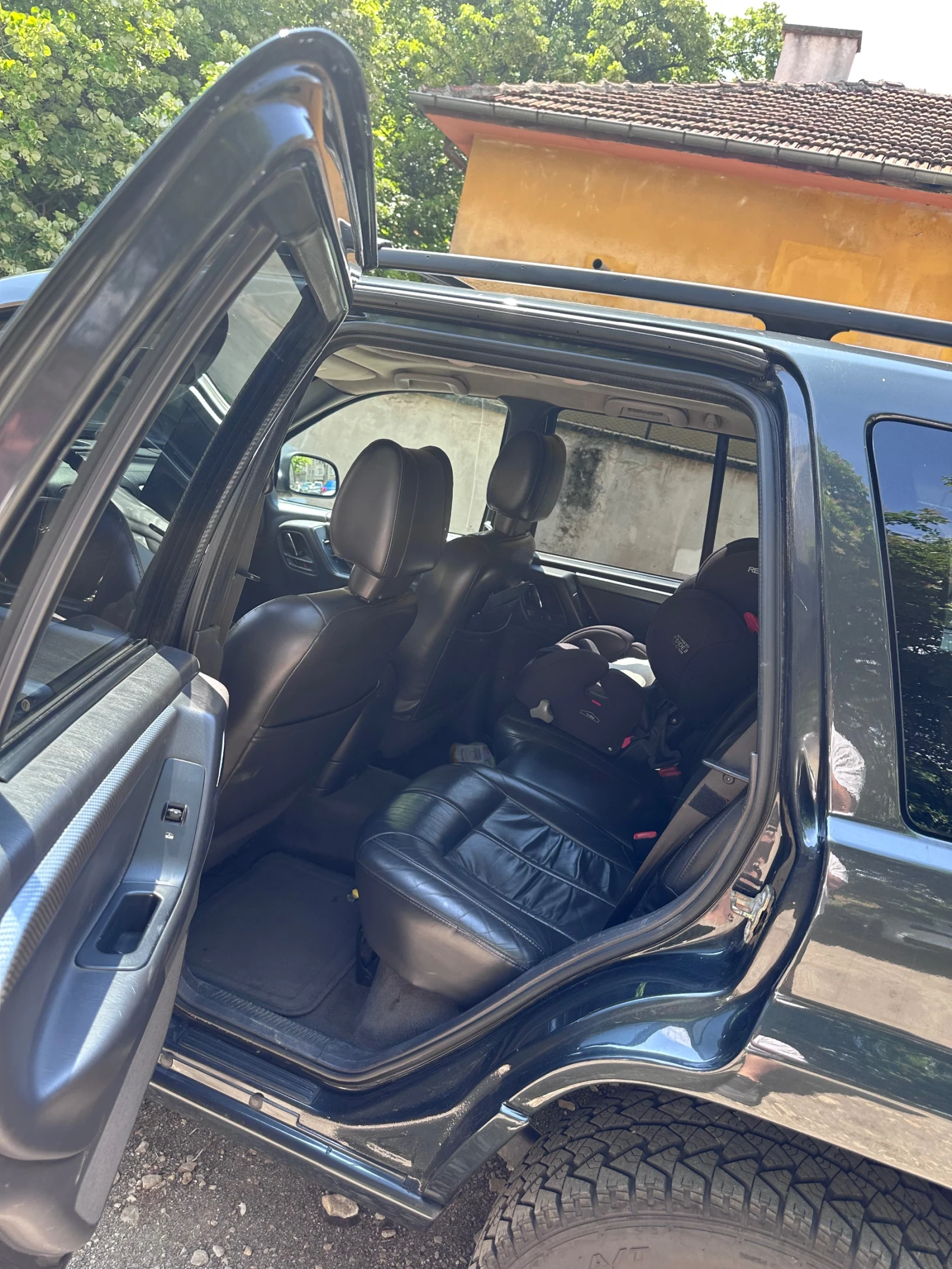 Jeep Grand cherokee 4.7 Quadra-Drive, снимка 15 - Автомобили и джипове - 55436968