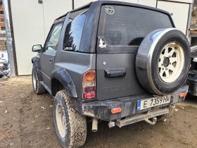 Suzuki Grand vitara     1.6 8   +  | Mobile.bg    4