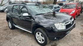 Dacia Duster 1.6i, снимка 2