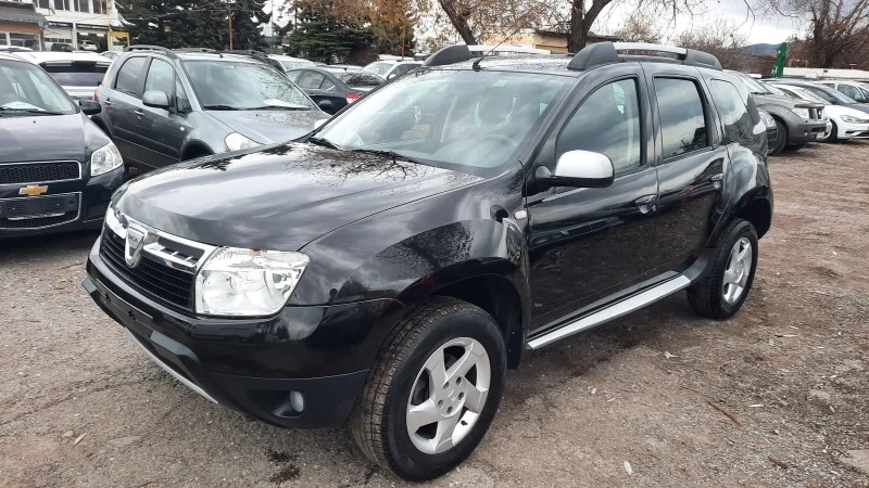 Dacia Duster 1.6i, снимка 1 - Автомобили и джипове - 43414491