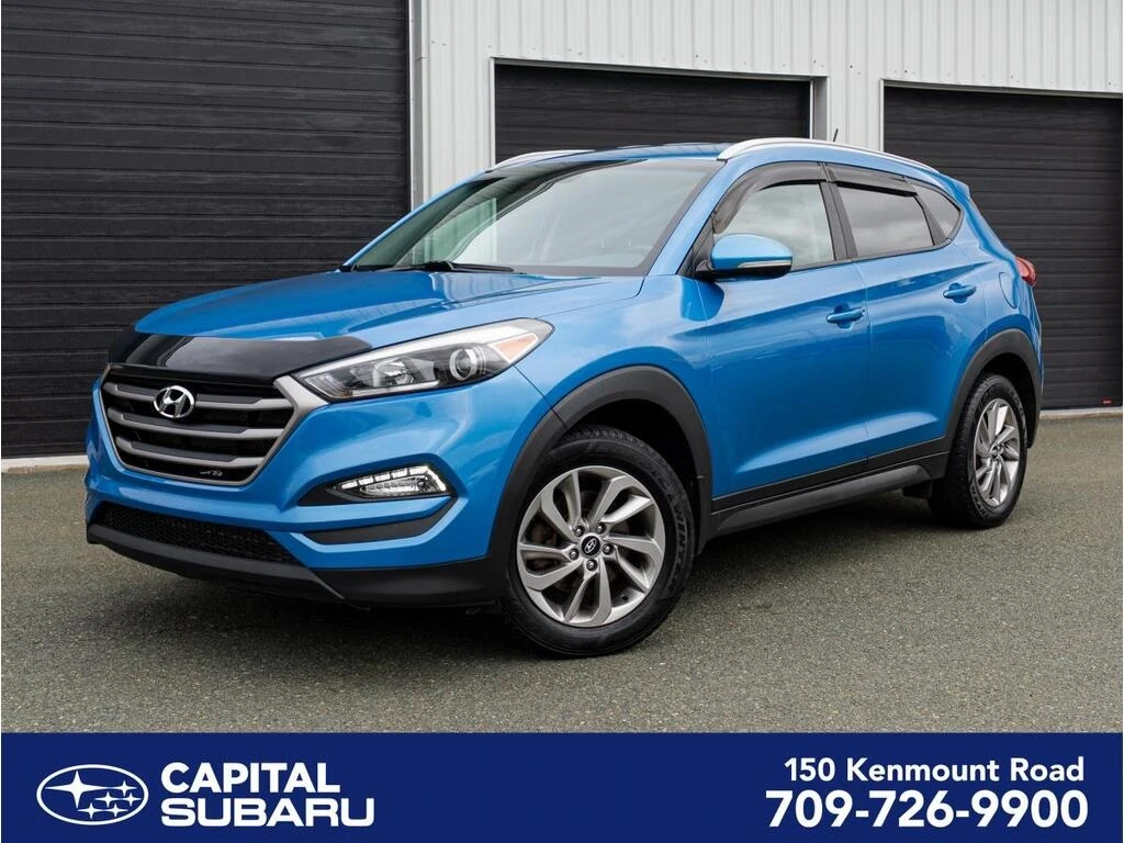 Hyundai Tucson * Awd 2.0l Premium * CARFAX * БЕЗ ПЪРВОНАЧАЛНА ВНО, снимка 1