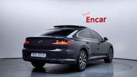 VW Arteon 2.0 TDI* BLIND SPOT* МАСАЖ* ЕЛ. БАГАЖНИК* ЛЮК* КРА, снимка 2