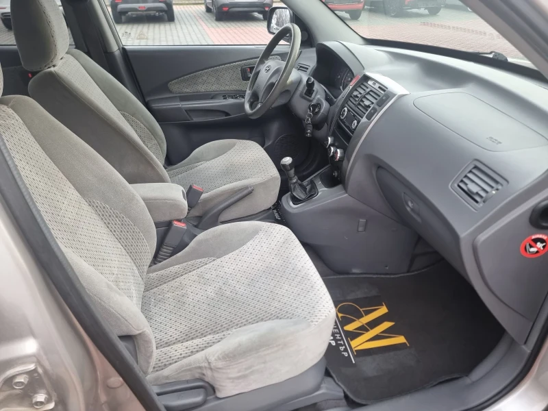 Hyundai Tucson 2.0 CRDI , снимка 10 - Автомобили и джипове - 53016562
