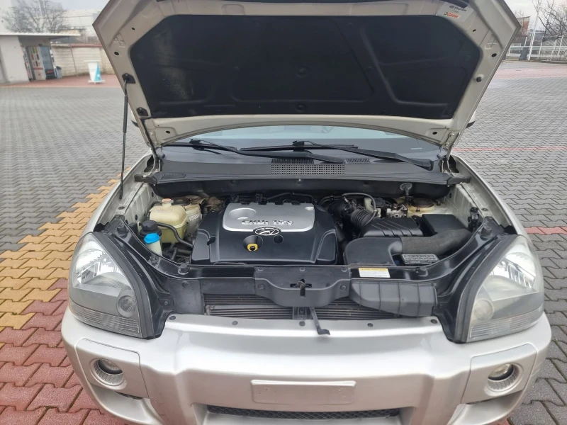 Hyundai Tucson 2.0 CRDI , снимка 14 - Автомобили и джипове - 53016562