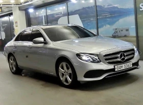 ������ Mercedes-Benz E 200