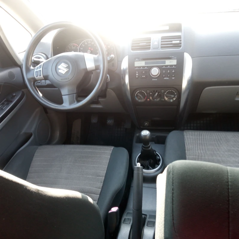 Suzuki SX4, снимка 12 - Автомобили и джипове - 48607920