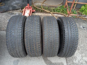 Гуми Зимни 215/60R16, снимка 1 - Гуми и джанти - 47260364