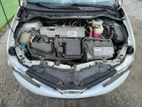 Toyota Auris 1.8 HYBRID, снимка 14 - Автомобили и джипове - 45415070