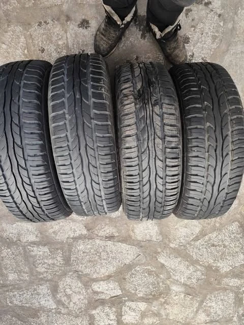 Гуми Всесезонни 185/60R15, снимка 2 - Гуми и джанти - 49360085