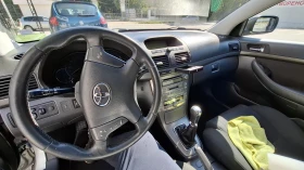 Toyota Avensis Комби, снимка 11