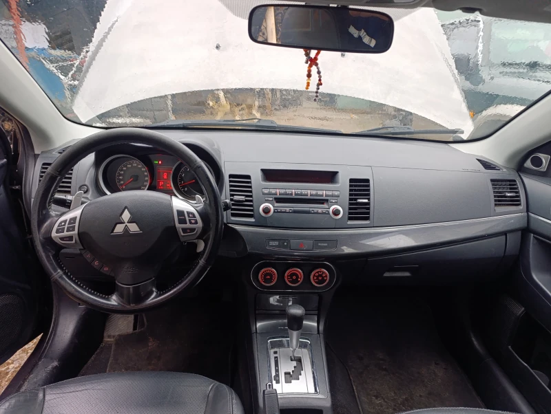Mitsubishi Lancer 1.8 автомат , кожа ксенон , снимка 12 - Автомобили и джипове - 49731825