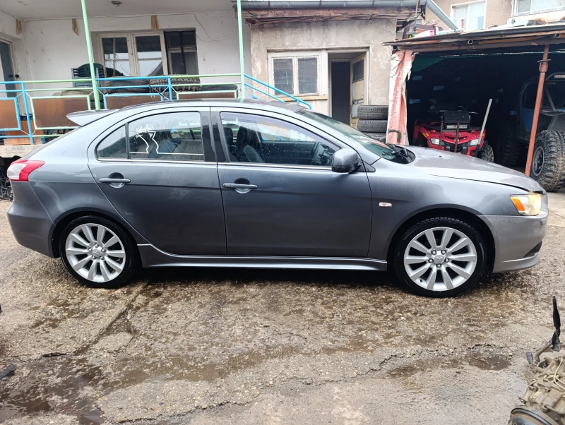Mitsubishi Lancer 1.8 автомат , кожа ксенон , снимка 3 - Автомобили и джипове - 49731825