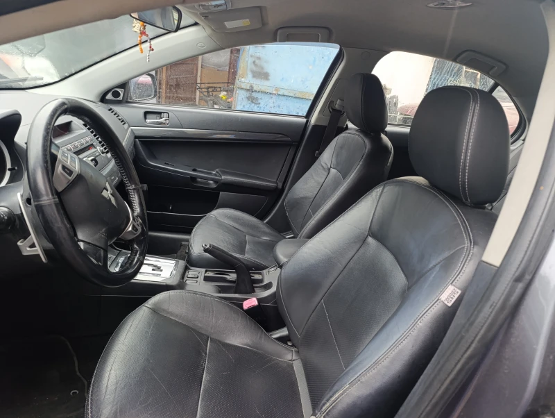 Mitsubishi Lancer 1.8 автомат , кожа ксенон , снимка 7 - Автомобили и джипове - 49731825