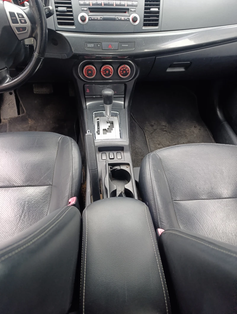 Mitsubishi Lancer 1.8 автомат , кожа ксенон , снимка 11 - Автомобили и джипове - 49731825