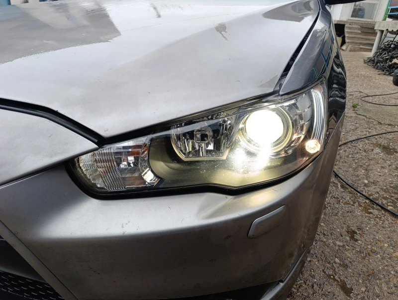 Mitsubishi Lancer 1.8 автомат , кожа ксенон , снимка 5 - Автомобили и джипове - 49731825