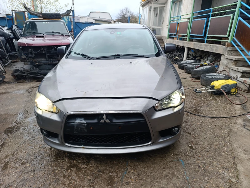 Mitsubishi Lancer 1.8 автомат , кожа ксенон 