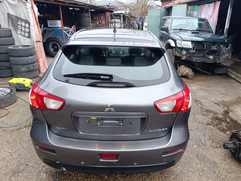 Mitsubishi Lancer 1.8 автомат , кожа ксенон , снимка 4 - Автомобили и джипове - 49731825