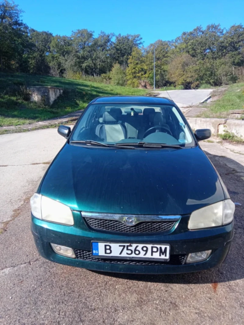 Mazda 323, снимка 1 - Автомобили и джипове - 47663808