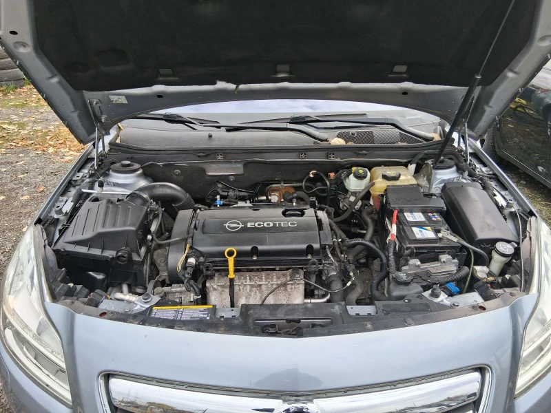 Opel Insignia 1.8  140кс, снимка 14 - Автомобили и джипове - 53010893