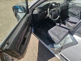 Toyota Corolla 1.3 16v (E110), снимка 10