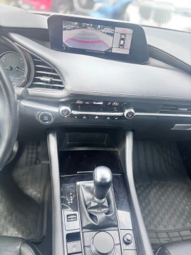 Mazda 3 4x4, снимка 17