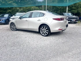 Mazda 3 4x4, снимка 2