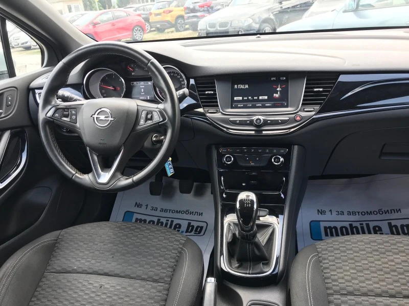 Opel Astra 1.6-NAVi-110кс, снимка 11 - Автомобили и джипове - 40410688