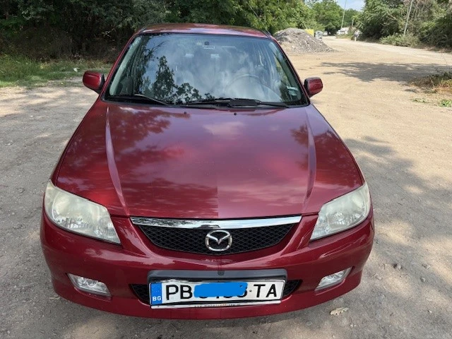 Mazda 323 1500, снимка 11 - Автомобили и джипове - 53686485