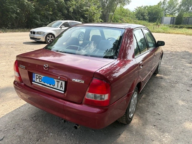 Mazda 323 1500, снимка 13 - Автомобили и джипове - 53686485