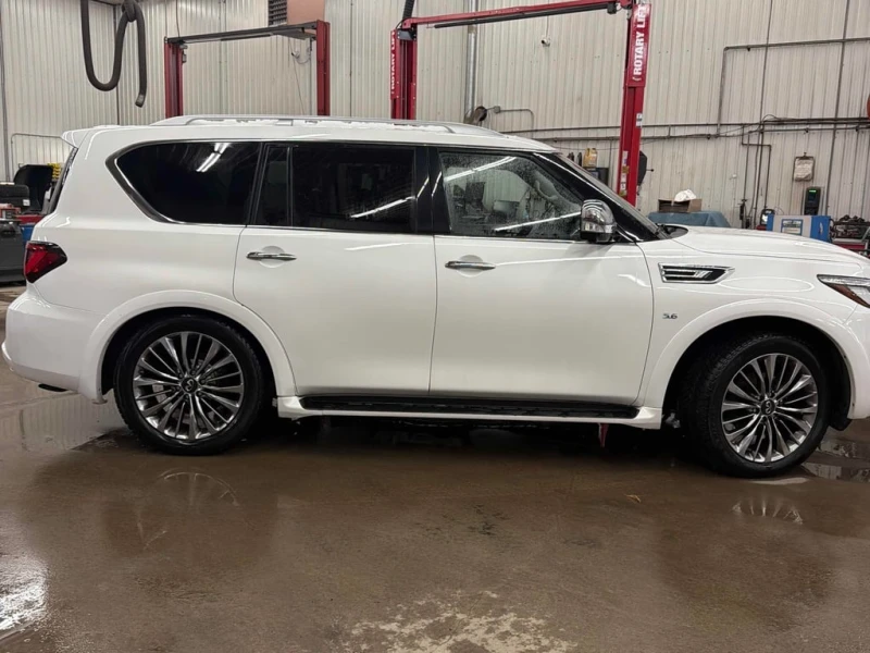 Infiniti QX80 * LUXE 7 Passenger * CARFAX * БЕЗ ПЪРВОНАЧАЛНА ВНО, снимка 3 - Автомобили и джипове - 52828824