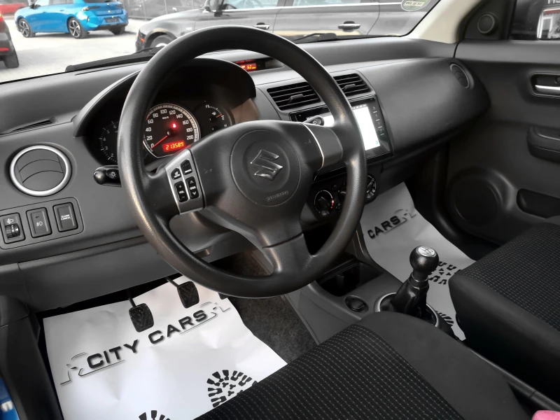 Suzuki Swift 1.3, снимка 11 - Автомобили и джипове - 52838436
